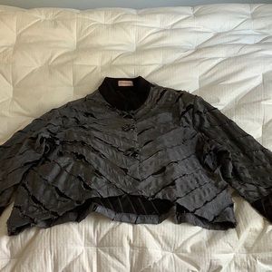 Classy or great with jeans jacket. One of a kind, size M.  Unique and versatile